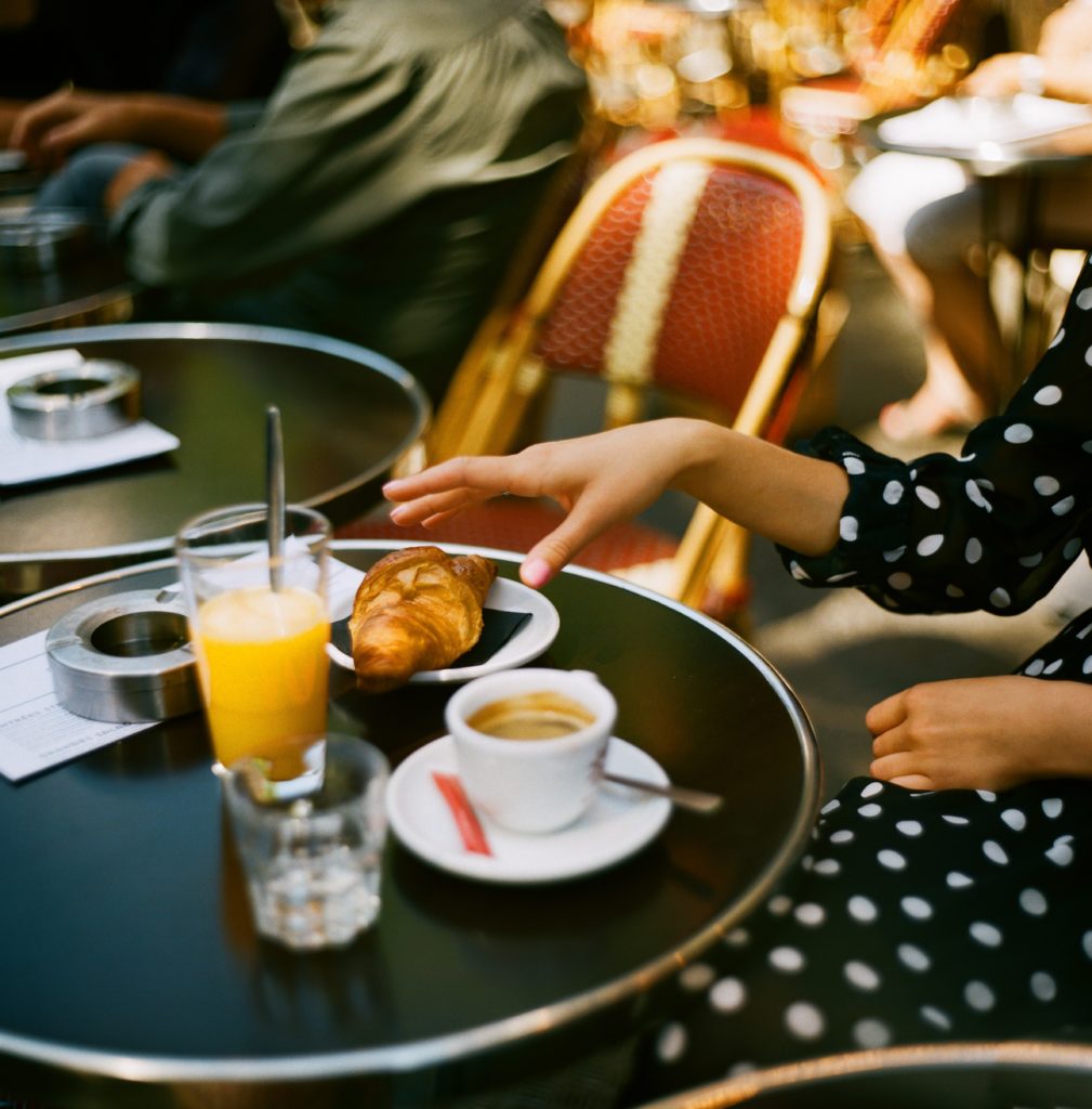 Paris Guide: Paris breakfast with Croissant, coffee and orange juice.