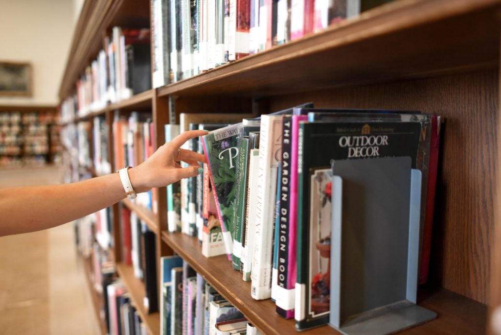 Books on a shelf in a library