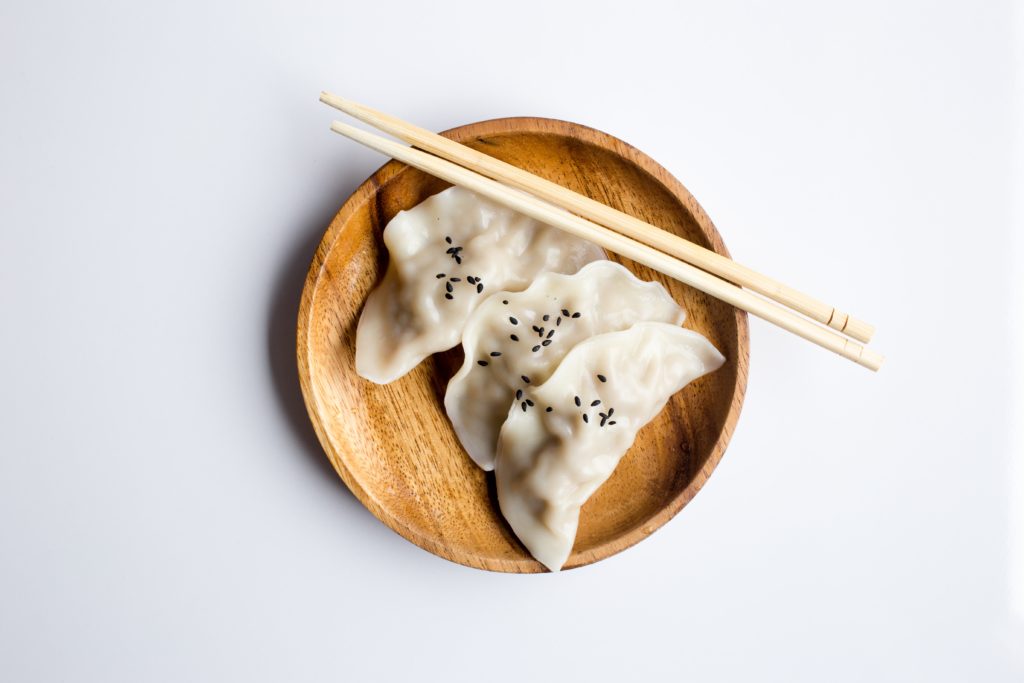 Asian food (dumplings) and chopsticks, not from KuYa Malta